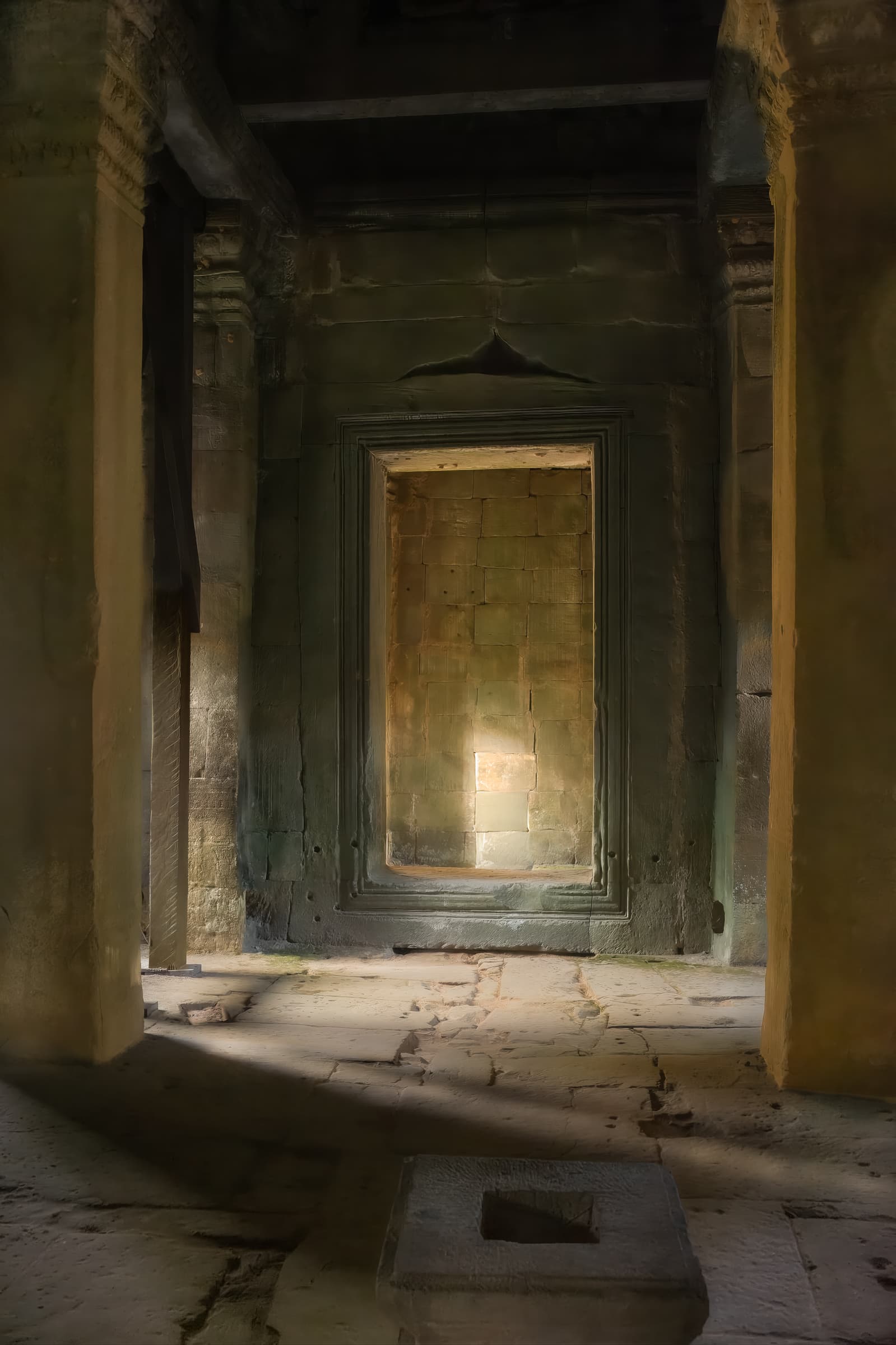 Angkor Wat, Siem Reap, Cambodia. Shafts of light pierce the shadows in Preah Khan (Sacred Sword) Temple.